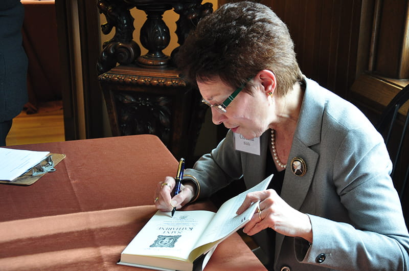 Cordelia Biddle signs book