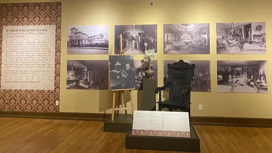 A wall in If These Walls Could Talk showing photographs of the interior and exterior of Anthony J. Drexel’s home, with one of the few known photographs of the founder on the easel next to a chair he used. Natalee Mayes arranged the photographs in a manner similar to the way the art was hung in the founder’s house. Photo courtesy Natalee Mayes.