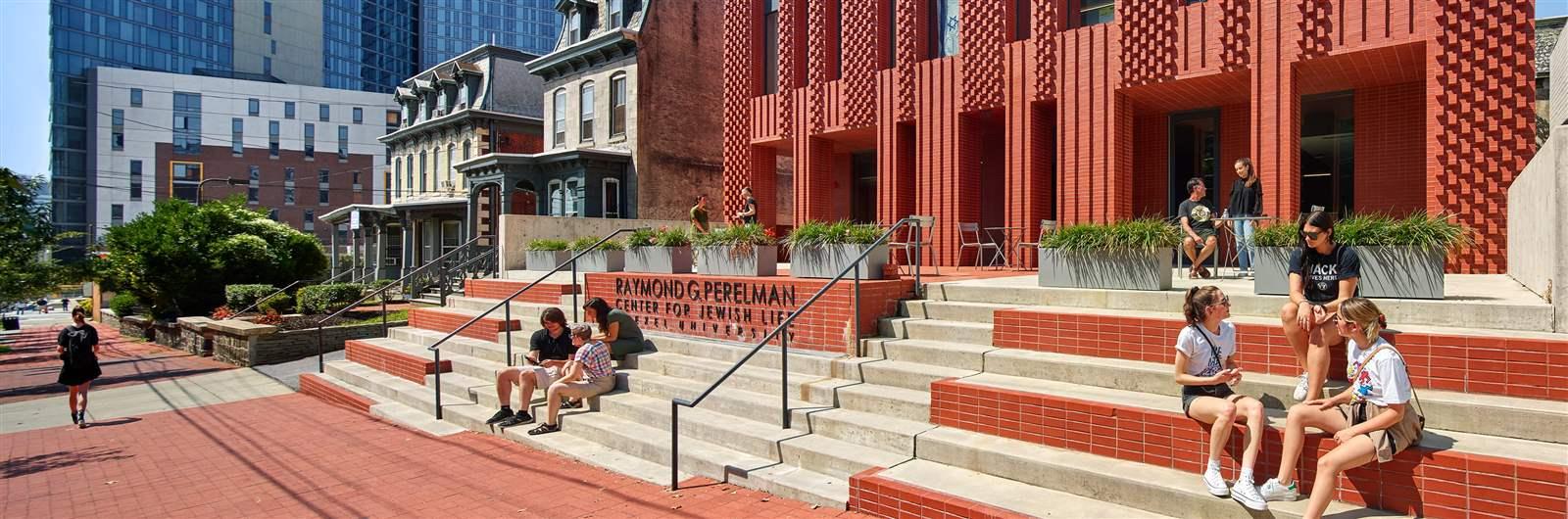 Students sitting on steps at Student Center