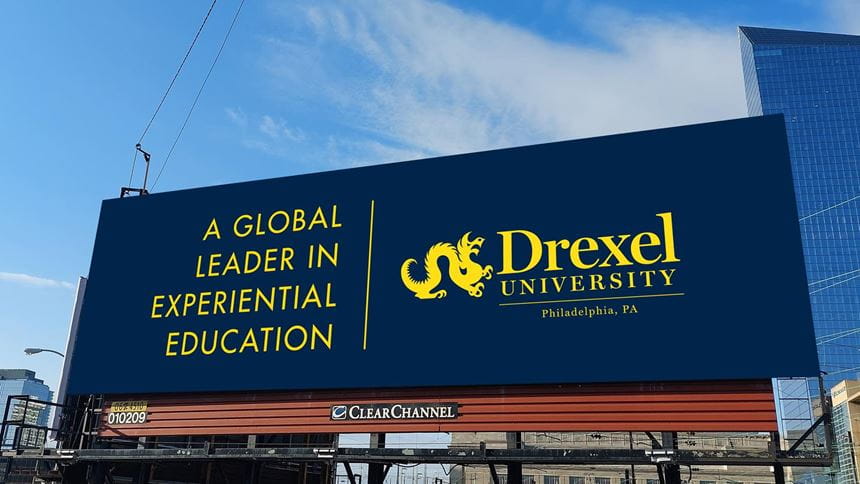 Drexel billboard on display near 30th Street reads: A Global Leader in Experiential Education