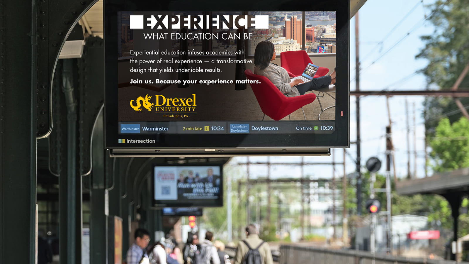 Experience Drexel ad display at a train station