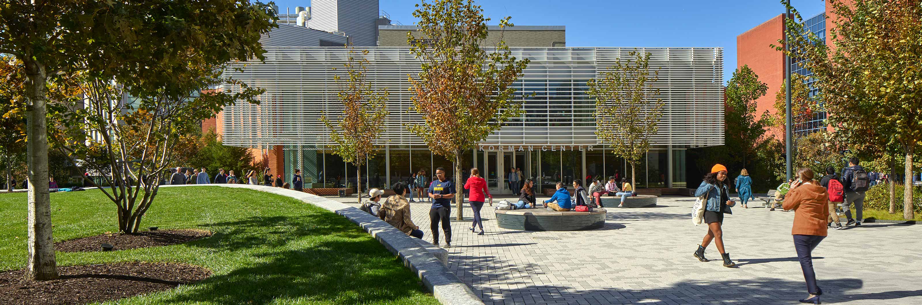 Two students walking by Buckley Recreational Field 