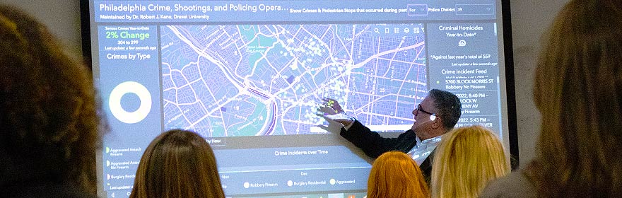 Drexel Criminology and Justice Studies professor Rob Kane delivers a lecture on policing operations in Philadelphia.