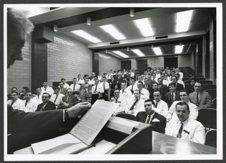 Students listening to a lecture in the New College Building, 1964. (The Legacy Center Archives and Special Collections)