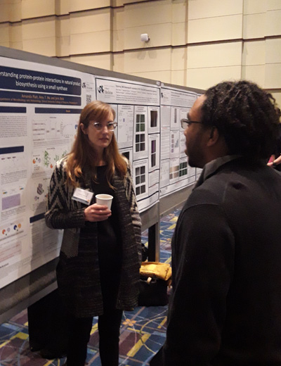 Amanda Platt, CAMP lab member, with her poster at Discovery Day 2019