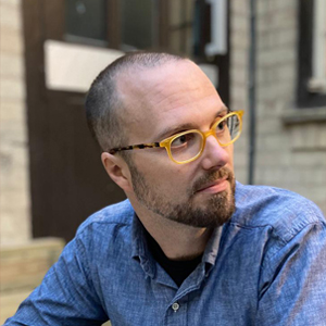 Professor Eric Karnes headshot