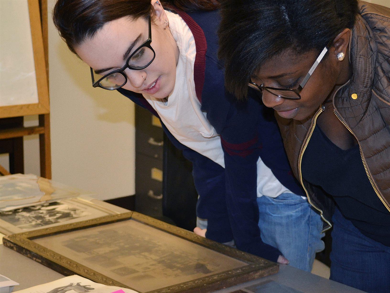 students looking at an object