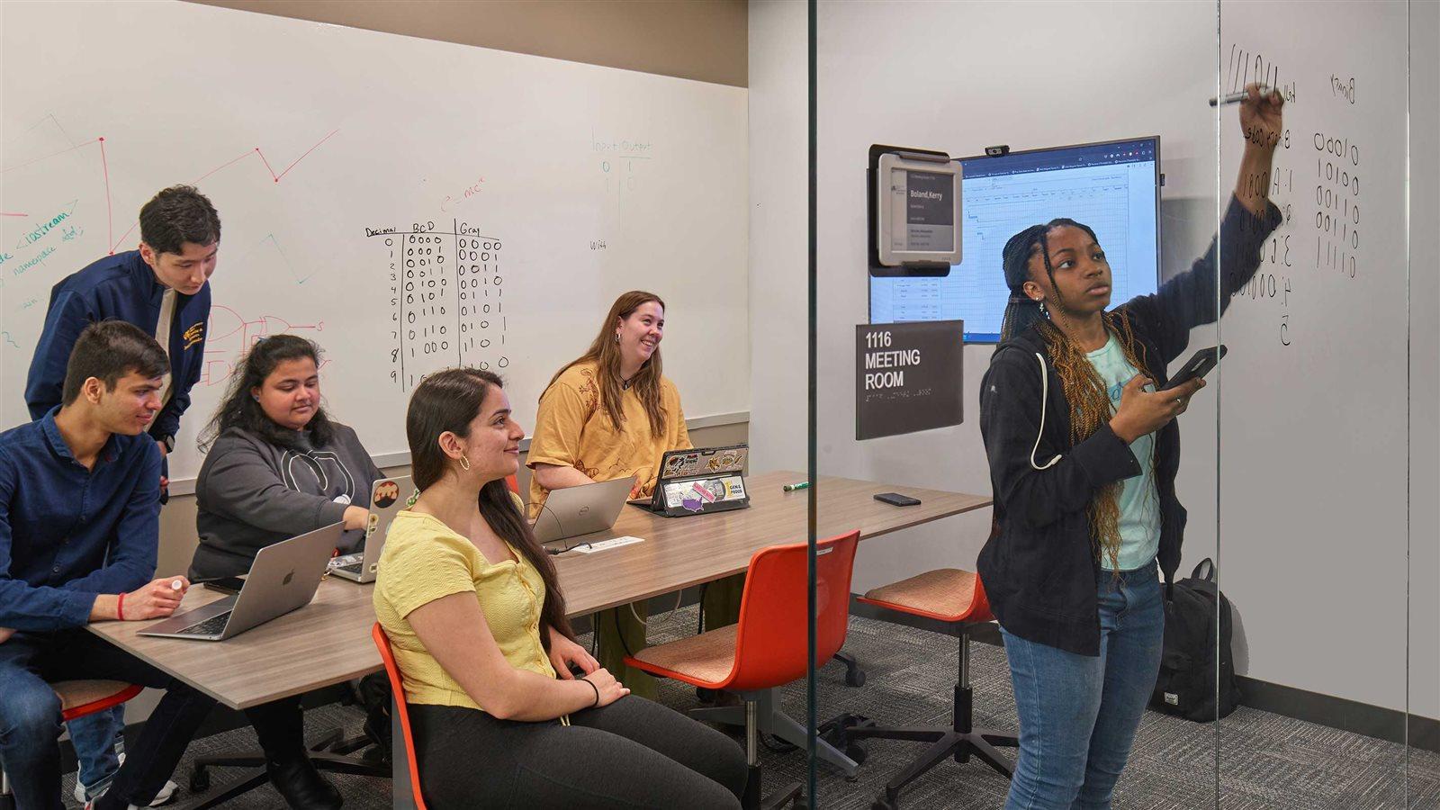 Drexel Students in a collaboration room