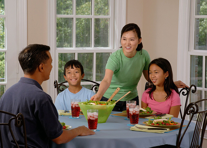 Family having meal at dinner table