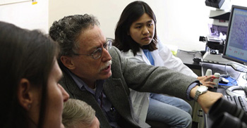 Itzhak Fischer, PhD, with graduate school students at Drexel University College of Medicine.